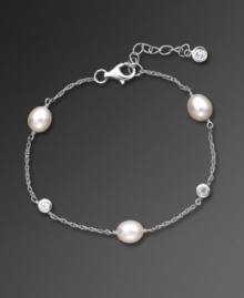 Featuring freshwater pearls (6-1/2 to 8 mm) and sparkling cubic zirconia accents (1/2 ct. t.w.) set in sterling silver, CRISLU's bracelet epitomizes understated elegance. Approximate length: 7 inches. Featuring freshwater pearls (6-1/2 to 8 mm) and sparkling cubic zirconia accents (1/2 ct. t.w.) set in sterling silver, CRISLU's bracelet epitomizes understated elegance. Approximate length: 7 inches.