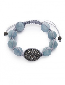 THE LOOKLuxury CollectionFaceted aquamarine beadsMoonstone accents1.8 tcw diamond-studded detailRhodium-plated sterling silver beadCord setting with adjustable closureTHE MEASUREMENTAdjustable diameter, about 2-3ORIGINMade in USA THE LOOKLuxury CollectionFaceted aquamarine beadsMoonstone accents1.8 tcw diamond-studded detailRhodium-plated sterling silver beadCord setting with adjustable closureTHE MEASUREMENTAdjustable diameter, about 2-3ORIGINMade in USA