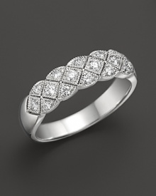 Diamonds set in a 14K. white gold band. Diamonds set in a 14K. white gold band.
