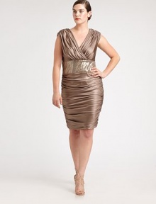 You will shimmer and shine in this metallic jersey dress with eye-catching sequins adorning the waist. Its ruched skirt will complement your curves flawlessly. V-necklineSleevelessSequin-embellished waistConcealed back zipper Fully linedAbout 26 from natural hem92% polyester/8% spandexDry cleanImported You will shimmer and shine in this metallic jersey dress with eye-catching sequins adorning the waist. Its ruched skirt will complement your curves flawlessly. V-necklineSleevelessSequin-embellished waistConcealed back zipper Fully linedAbout 26 from natural hem92% polyester/8% spandexDry cleanImported