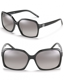 Lounge pool-side in these chic oversized square sunglasses from Fendi. Lounge pool-side in these chic oversized square sunglasses from Fendi.