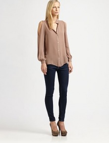 Cutout shoulders and a Mandarin collar revive this traditional silk shirt. Mandarin collarButton frontCutout shouldersLong bishop sleeves with buttoned cuffsLonger length hits below the hipsSilkDry cleanImportedModel shown is 5'11 (178cm) wearing US size Small. Cutout shoulders and a Mandarin collar revive this traditional silk shirt. Mandarin collarButton frontCutout shouldersLong bishop sleeves with buttoned cuffsLonger length hits below the hipsSilkDry cleanImportedModel shown is 5'11 (178cm) wearing US size Small.