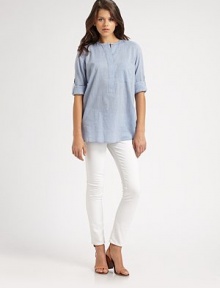 Lengthy cotton staple has a subtle v-neck and roll-tab sleeves. V-neckButton frontFront patch pocketRoll-tab sleevesLonger length hits below the hipsCottonMachine washImportedModel shown is 5'11 (180cm) wearing US size 4. Lengthy cotton staple has a subtle v-neck and roll-tab sleeves. V-neckButton frontFront patch pocketRoll-tab sleevesLonger length hits below the hipsCottonMachine washImportedModel shown is 5'11 (180cm) wearing US size 4.