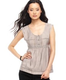 Add instant romance to your wardrobe with this DKNY Jeans babydoll top, featuring dainty lace and embroidered trim. Pair it with flared jeans for a boho look or with skinny black pants for modern appeal. Add instant romance to your wardrobe with this DKNY Jeans babydoll top, featuring dainty lace and embroidered trim. Pair it with flared jeans for a boho look or with skinny black pants for modern appeal.