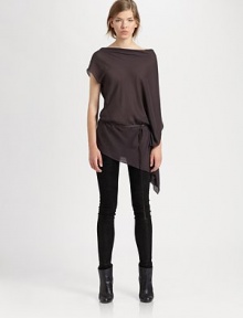 Finished with a detachable leather belt, this semi-sheer boatneck has a single cape sleeve, single short sleeve and an asymmetrical hem. BoatneckSingle short sleeveSingle cape sleeveDetachable leather beltAsymmetrical hemViscoseDry cleanImported of Italian fabricModel shown is 5'10 (177cm) wearing US size Small.OUR FIT MODEL RECOMMENDS ordering true size. Finished with a detachable leather belt, this semi-sheer boatneck has a single cape sleeve, single short sleeve and an asymmetrical hem. BoatneckSingle short sleeveSingle cape sleeveDetachable leather beltAsymmetrical hemViscoseDry cleanImported of Italian fabricModel shown is 5'10 (177cm) wearing US size Small.OUR FIT MODEL RECOMMENDS ordering true size.