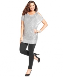 Show off your shimmer in DKNYC's plus size tunic sweater, featuring a cold shoulder design and sequined finish-- it's holiday party-perfect! Show off your shimmer in DKNYC's plus size tunic sweater, featuring a cold shoulder design and sequined finish-- it's holiday party-perfect!