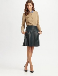 Timeless button-down shirt modernized by a contrasting point collar and length that hits below the hips. Point collarButton frontLong sleevesButtoned cuffsCottonDry cleanImportedModel shown is 5'10 (177cm) wearing US size 4. Timeless button-down shirt modernized by a contrasting point collar and length that hits below the hips. Point collarButton frontLong sleevesButtoned cuffsCottonDry cleanImportedModel shown is 5'10 (177cm) wearing US size 4.