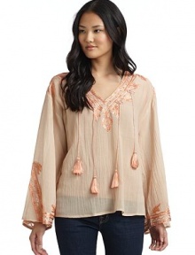 THE LOOKSheer crinkle designV-neckLong wide sleevesContrast silk embroideryDangling tassel detailsTHE FITAbout 23 from shoulder to hemTHE MATERIAL55% cotton/45% silkEmbroidery: silkCARE & ORIGINDry cleanImportedModel shown is 5'10 (177cm) wearing US size Small. THE LOOKSheer crinkle designV-neckLong wide sleevesContrast silk embroideryDangling tassel detailsTHE FITAbout 23 from shoulder to hemTHE MATERIAL55% cotton/45% silkEmbroidery: silkCARE & ORIGINDry cleanImportedModel shown is 5'10 (177cm) wearing US size Small.