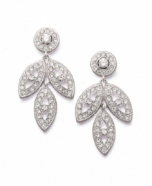 Primed for the party. Eliot Danori's Mosaic Elegance Triple Drop earrings add extra appeal to any ensemble. Earrings feature a pretty, three-leaf pattern and sparkling crystals and cubic zirconias (1/5 ct. t.w.). Crafted in silver tone mixed metal. Approximate drop: 1-1/4 inches. Primed for the party. Eliot Danori's Mosaic Elegance Triple Drop earrings add extra appeal to any ensemble. Earrings feature a pretty, three-leaf pattern and sparkling crystals and cubic zirconias (1/5 ct. t.w.). Crafted in silver tone mixed metal. Approximate drop: 1-1/4 inches.