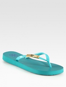The perfect beach sandal crafted of durable PVC and accented with a shiny goldtone logo detail. PVC upperPVC liningRubber solePadded insoleImported The perfect beach sandal crafted of durable PVC and accented with a shiny goldtone logo detail. PVC upperPVC liningRubber solePadded insoleImported