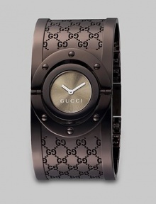 From the Twirl Collection. A modern design with a sun-brushed color dial and a brown PVD GG pattern cuff. Swiss quartz movementWater resistant to 3 ATMBrown PVD case, 23mm (0.9)Riveted bezelBrown sun-brushed color dialBrown PVD cuffMade in Switzerland From the Twirl Collection. A modern design with a sun-brushed color dial and a brown PVD GG pattern cuff. Swiss quartz movementWater resistant to 3 ATMBrown PVD case, 23mm (0.9)Riveted bezelBrown sun-brushed color dialBrown PVD cuffMade in Switzerland