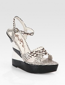 Two-tone cork wedge has skinny snake-print leather straps and an adjustable slingback. Painted cork wedge, 5½ (140mm)Painted cork platform, 1 (25mm)Compares to a 4½ heel (115mm)Snake-print leather upperLeather lining and solePadded insoleImportedOUR FIT MODEL RECOMMENDS ordering one half size up as this style runs small. Two-tone cork wedge has skinny snake-print leather straps and an adjustable slingback. Painted cork wedge, 5½ (140mm)Painted cork platform, 1 (25mm)Compares to a 4½ heel (115mm)Snake-print leather upperLeather lining and solePadded insoleImportedOUR FIT MODEL RECOMMENDS ordering one half size up as this style runs small.