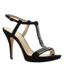 The Isola Iris Pumps add a glow to your dressy looks with their satin t-strap upper, jewel decor and elegantly tapered high heel. The Isola Iris Pumps add a glow to your dressy looks with their satin t-strap upper, jewel decor and elegantly tapered high heel.