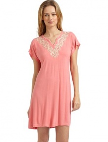 THE LOOKSolid trim and beautiful embroidery at the necklineShort sleevesPullover styleContrast trim stitching at the cuffs and hemTHE FITAbout 34 from shoulder to hemTHE MATERIAL95% modal/5% spandexCARE & ORIGINMachine washImported THE LOOKSolid trim and beautiful embroidery at the necklineShort sleevesPullover styleContrast trim stitching at the cuffs and hemTHE FITAbout 34 from shoulder to hemTHE MATERIAL95% modal/5% spandexCARE & ORIGINMachine washImported