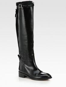 Sleek straps complement this ultra-tall design, impeccably constructed of fine Italian leather. Stacked heel, 1½ (40mm)Shaft, 20½Leg circumference, 16Leather upperPull-on styleAdjustable buckle strap and snap closureLeather lining and solePadded insoleMade in ItalyOUR FIT MODEL RECOMMENDS ordering true size. Sleek straps complement this ultra-tall design, impeccably constructed of fine Italian leather. Stacked heel, 1½ (40mm)Shaft, 20½Leg circumference, 16Leather upperPull-on styleAdjustable buckle strap and snap closureLeather lining and solePadded insoleMade in ItalyOUR FIT MODEL RECOMMENDS ordering true size.