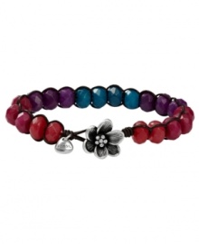 Pick some berries this season. Fossil's beaded bracelet features a chic, chocolate brown leather cord decorated with dyed faceted jade beads. Crafted in silver tone mixed metal with a sculpted flower at closure. Approximate length: 8 inches. Pick some berries this season. Fossil's beaded bracelet features a chic, chocolate brown leather cord decorated with dyed faceted jade beads. Crafted in silver tone mixed metal with a sculpted flower at closure. Approximate length: 8 inches.