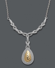 Versatile style that makes a statement. Giani Bernini's stunning statement necklace features an intricate crisscross design and a hammered teardrop-shaped pendant. Set in 24k gold over sterling silver and sterling silver. Approximate length: 17 inches Approximate drop: 1-1/2 inches. Versatile style that makes a statement. Giani Bernini's stunning statement necklace features an intricate crisscross design and a hammered teardrop-shaped pendant. Set in 24k gold over sterling silver and sterling silver. Approximate length: 17 inches Approximate drop: 1-1/2 inches.