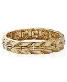 Chevrons star in this stretch bracelet from Fossil. Crafted from gold-tone mixed metal. Approximate diameter: 2-1/4 inches. Chevrons star in this stretch bracelet from Fossil. Crafted from gold-tone mixed metal. Approximate diameter: 2-1/4 inches.