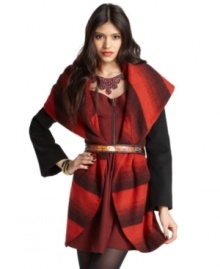 An oversized shawl collar adds chic drama to this Bar III striped coat for a fashion-forward fall look!