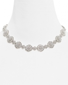 Love: the Nadri Love Knot All Around Necklace encircles you in elegance, with a beautiful, pavé floral motif. Love: the Nadri Love Knot All Around Necklace encircles you in elegance, with a beautiful, pavé floral motif.