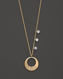 Diamonds and a circle pendant in 14K yellow gold. By Meira T. Diamonds and a circle pendant in 14K yellow gold. By Meira T.