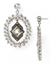 The plot thickens. This pair of Juicy Couture drop earrings adds drama, cast in plated metal with dangling crystal beads. The plot thickens. This pair of Juicy Couture drop earrings adds drama, cast in plated metal with dangling crystal beads.