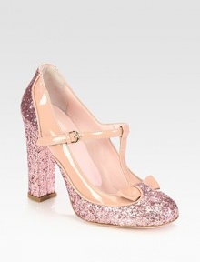 For extra va-va-voom, try this glittery patent leather pump with a feminine t-strap and bow. Glitter-covered heel, 4 (100mm)Glitter-coated fabric and patent leather upperAdjustable t-strapLeather lining and solePadded insoleMade in Italy For extra va-va-voom, try this glittery patent leather pump with a feminine t-strap and bow. Glitter-covered heel, 4 (100mm)Glitter-coated fabric and patent leather upperAdjustable t-strapLeather lining and solePadded insoleMade in Italy