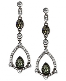 Glistening touches add glamour to these earrings from Givenchy. Crafted from hematite-tone mixed metal, the pair features clear and dark green glass crystal stones for a stunning effect. Approximate drop: 6-1/5 inches. Glistening touches add glamour to these earrings from Givenchy. Crafted from hematite-tone mixed metal, the pair features clear and dark green glass crystal stones for a stunning effect. Approximate drop: 6-1/5 inches.
