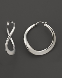 A twist on the classic hoop, these 14K. white gold earrings are luxe and modern. A twist on the classic hoop, these 14K. white gold earrings are luxe and modern.