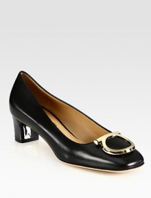 This classic leather silhouette is upgraded with a goldtone metal heel and large buckle. Metal heel, 1½ (40mm)Leather upperSquare toeLeather lining and solePadded insoleMade in ItalyOUR FIT MODEL RECOMMENDS ordering one half size up as this style runs small. This classic leather silhouette is upgraded with a goldtone metal heel and large buckle. Metal heel, 1½ (40mm)Leather upperSquare toeLeather lining and solePadded insoleMade in ItalyOUR FIT MODEL RECOMMENDS ordering one half size up as this style runs small.