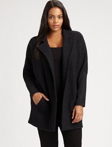 Whether worn over a sleek or relaxed-fit top, this boiled merino wool coat is sure to make a stylish first impression. Notched collarDolman sleevesWelt pocketsAbout 32 from shoulder to hemBody: merino woolSleeves: merino wool/nylon/spandexDry cleanImported Whether worn over a sleek or relaxed-fit top, this boiled merino wool coat is sure to make a stylish first impression. Notched collarDolman sleevesWelt pocketsAbout 32 from shoulder to hemBody: merino woolSleeves: merino wool/nylon/spandexDry cleanImported