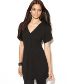 A V-neck tunic from INC makes a great base for any outfit. Wear it with leggings or jeans and a statement necklace to dress up the look! A V-neck tunic from INC makes a great base for any outfit. Wear it with leggings or jeans and a statement necklace to dress up the look!