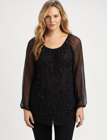 You will certainly sparkle in this chiffon top with a feminine neckline and sequin-adorned front.Drawstring necklineLong sleevesSequin frontCurved hemPull-on styleAbout 30 from shoulder to hemSilkDry cleanImported