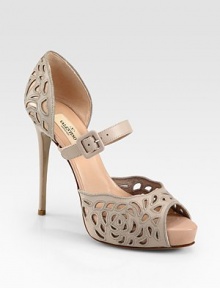 Exquisite cutouts define this leather platform design inspired by the timeless Mary Jane silhouette. Self-covered heel, 4¾ (120mm)Covered platform, 1 (25mm)Compares to a 3¾ heel (95mm)Leather upper with cutoutsPeep toeAdjustable ankle strapLeather lining and solePadded insoleMade in ItalyOUR FIT MODEL RECOMMENDS ordering true size. 