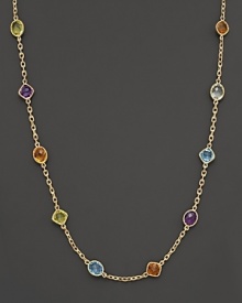 This multi gemstone necklace features colorful stone stations against a stunning 14 Kt. gold setting and chain. This multi gemstone necklace features colorful stone stations against a stunning 14 Kt. gold setting and chain.