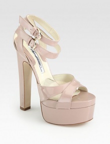 Double ankle straps top this ultra-high platform silhouette of reflective Italian patent leather. Self-covered heel, 6 (150mm)Covered platform, 2 (50mm)Compares to a 4 heel (100mm)Patent leather upperAdjustable ankle strapsLeather lining and solePadded insoleMade in Italy Double ankle straps top this ultra-high platform silhouette of reflective Italian patent leather. Self-covered heel, 6 (150mm)Covered platform, 2 (50mm)Compares to a 4 heel (100mm)Patent leather upperAdjustable ankle strapsLeather lining and solePadded insoleMade in Italy