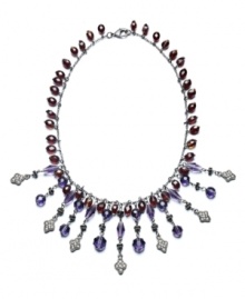 Illuminate the neckline of your favorite party dress with this dazzling collar necklace. Lauren by Ralph Lauren brings on the glamour with this glass and resin bead design in blue and purple hues. Crafted in silver tone mixed metal. Approximate length: 18 inches. Approximate drop: 3 inches. Illuminate the neckline of your favorite party dress with this dazzling collar necklace. Lauren by Ralph Lauren brings on the glamour with this glass and resin bead design in blue and purple hues. Crafted in silver tone mixed metal. Approximate length: 18 inches. Approximate drop: 3 inches.