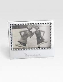 EXCLUSIVELY AT SAKS. The perfect display for your most cherished photograph, handcrafted in recycled aluminum with etched Memories detail along the bottom. Recycled aluminum Accommodates a 4 X 6 photograph Overall: 5¾ X 6¾ Imported 