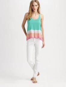 Airy racerback design with a vivacious tie-dyed print and cropped front hem. ScoopneckSleevelessCropped front hemRacerbackLonger length hits below the hips at backRayonHand washMade in USAModel shown is 5'10 (177cm) wearing US size Small. Airy racerback design with a vivacious tie-dyed print and cropped front hem. ScoopneckSleevelessCropped front hemRacerbackLonger length hits below the hips at backRayonHand washMade in USAModel shown is 5'10 (177cm) wearing US size Small.