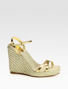 Metallic leather silhouette on a shimmering rope cord wedge. Metallic rope cord wedge, 4½ (115mm)Metallic rope cord platform, 1 (25mm)Compares to a 3½ heel (90mm)Metallic leather upperAdjustable ankle strapMetallic rope cord liningRubber solePadded insoleMade in Italy Metallic leather silhouette on a shimmering rope cord wedge. Metallic rope cord wedge, 4½ (115mm)Metallic rope cord platform, 1 (25mm)Compares to a 3½ heel (90mm)Metallic leather upperAdjustable ankle strapMetallic rope cord liningRubber solePadded insoleMade in Italy