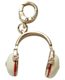 Get into the groove with this headset charm from Fossil. Crafted from gold-tone mixed metal, the charm features cream and red enamel, glass crystal details and a lobster-claw clip. Approximate length (charm): 7/8 inch; (clip) 1/2 inch. Get into the groove with this headset charm from Fossil. Crafted from gold-tone mixed metal, the charm features cream and red enamel, glass crystal details and a lobster-claw clip. Approximate length (charm): 7/8 inch; (clip) 1/2 inch.