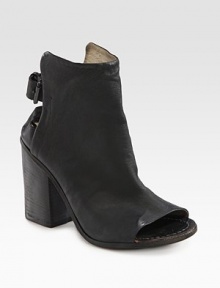 Modern, open-back design in soft leather, finished with a back buckle, stacked heel and peep toe. Stacked heel, 3½ (90mm)Leather upperLeather lining and solePadded insoleMade in Italy Modern, open-back design in soft leather, finished with a back buckle, stacked heel and peep toe. Stacked heel, 3½ (90mm)Leather upperLeather lining and solePadded insoleMade in Italy
