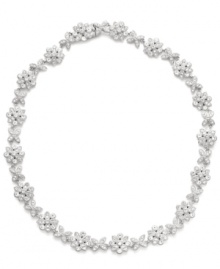 Botanical beauty. A fanciful floral motif shines brightly with sparkling crystals on this dazzling Eliot Danori necklace. Set in silver tone mixed metal, it's an alluring addition for any evening look. Approximate length: 16 inches. Botanical beauty. A fanciful floral motif shines brightly with sparkling crystals on this dazzling Eliot Danori necklace. Set in silver tone mixed metal, it's an alluring addition for any evening look. Approximate length: 16 inches.
