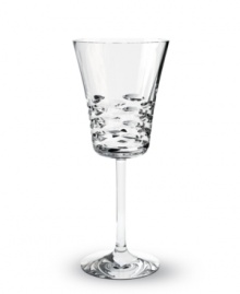 Classic technique, modern beauty. Crafted of fine Baccarat crystal, the Lola white wine glass pairs horizontal wedge cuts with a simply luminous base in a silhouette that radiates grace and sophistication. Classic technique, modern beauty. Crafted of fine Baccarat crystal, the Lola white wine glass pairs horizontal wedge cuts with a simply luminous base in a silhouette that radiates grace and sophistication.