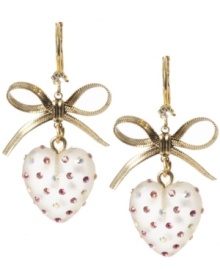 Glittering and girly. Add fun, flirty flair to your look with Betsey Johnson's heart-shaped drop earrings. Embellished with sparkling crystal accents and charming bows, they're made in gold tone mixed metal. Approximate drop: 1-3/4 inches. Glittering and girly. Add fun, flirty flair to your look with Betsey Johnson's heart-shaped drop earrings. Embellished with sparkling crystal accents and charming bows, they're made in gold tone mixed metal. Approximate drop: 1-3/4 inches.