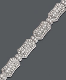 Unique design combines with extraordinary elegance. This beautifully-crafted bracelet features an intricate dot design covered in sparkling round-cut diamond (3 ct. t.w.) set in 14k white gold. Approximate length: 7-1/2 inches. Unique design combines with extraordinary elegance. This beautifully-crafted bracelet features an intricate dot design covered in sparkling round-cut diamond (3 ct. t.w.) set in 14k white gold. Approximate length: 7-1/2 inches.