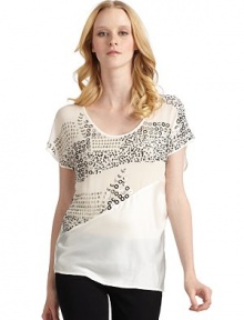THE LOOKSemi-sheer constructionSequins in frontShort sleevesTHE FITAbout 23 from shoulder to hemTHE MATERIALSilkCARE & ORIGINDry cleanImportedModel shown is 5'10½ (179cm) wearing US size Small. THE LOOKSemi-sheer constructionSequins in frontShort sleevesTHE FITAbout 23 from shoulder to hemTHE MATERIALSilkCARE & ORIGINDry cleanImportedModel shown is 5'10½ (179cm) wearing US size Small.