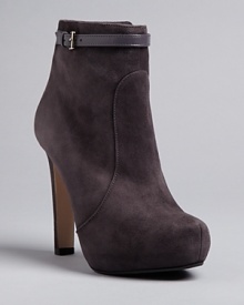 These Max Mara platform booties finish off luxurious suede, seamed uppers with elegant, slim belted ankle straps. The result is a basic with fashion authority. These Max Mara platform booties finish off luxurious suede, seamed uppers with elegant, slim belted ankle straps. The result is a basic with fashion authority.