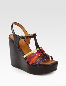 Flirty leather t-strap with a chunky wedge and adjustable multicolored straps. Self-covered wedge, 5 (125mm)Island platform, 1½ (40mm)Compares to a 3½ heel (90mm)Leather upperLeather liningRubber solePadded insoleMade in SpainOUR FIT MODEL RECOMMENDS ordering one half size up as this style runs small. Flirty leather t-strap with a chunky wedge and adjustable multicolored straps. Self-covered wedge, 5 (125mm)Island platform, 1½ (40mm)Compares to a 3½ heel (90mm)Leather upperLeather liningRubber solePadded insoleMade in SpainOUR FIT MODEL RECOMMENDS ordering one half size up as this style runs small.