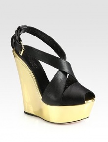 Adjustable leather criss-cross straps top a glimmering metallic leather wedge. Self-covered wedge, 6 (150mm)Covered platform, 1½ (40mm)Compares to a 4½ heel (115mm)Leather upperLeather lining and solePadded insoleMade in ItalyOUR FIT MODEL RECOMMENDS ordering one half size up as this style runs small. Adjustable leather criss-cross straps top a glimmering metallic leather wedge. Self-covered wedge, 6 (150mm)Covered platform, 1½ (40mm)Compares to a 4½ heel (115mm)Leather upperLeather lining and solePadded insoleMade in ItalyOUR FIT MODEL RECOMMENDS ordering one half size up as this style runs small.